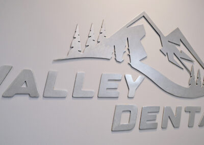 valley dental of port alberni custom metal logo